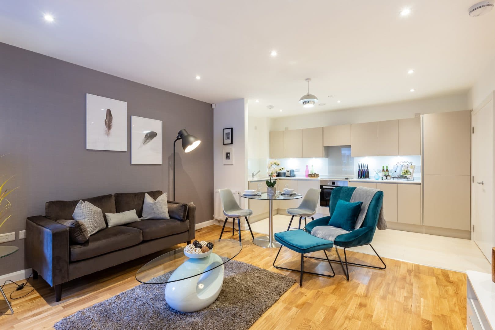 Furnished open-plan living room and kitchen at Signia Court, Wembley